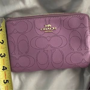 Coach -Purple leather ,small wristlet.